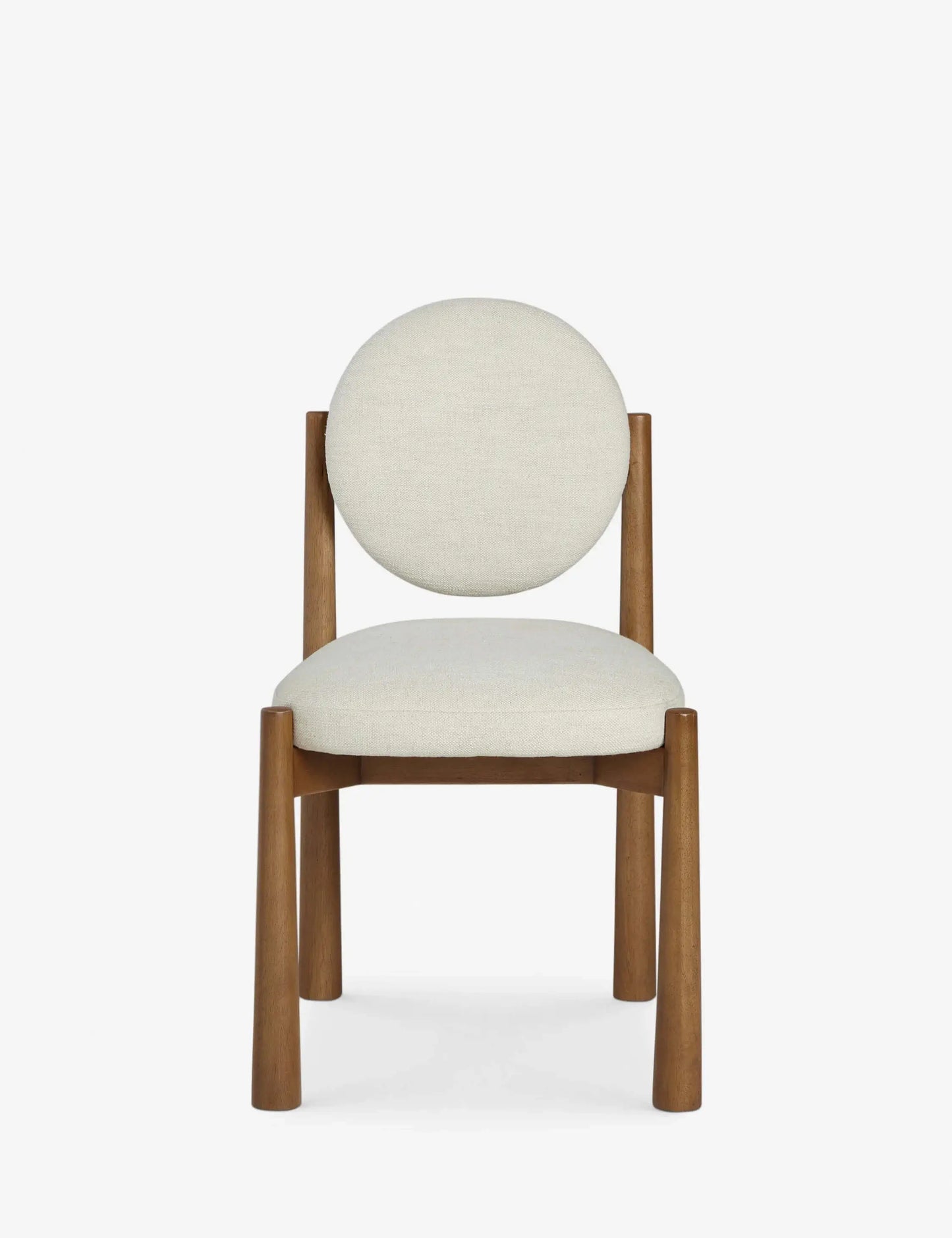 Front view of the Badr Dining Chair featuring a modern round back and neutral upholstered seat.