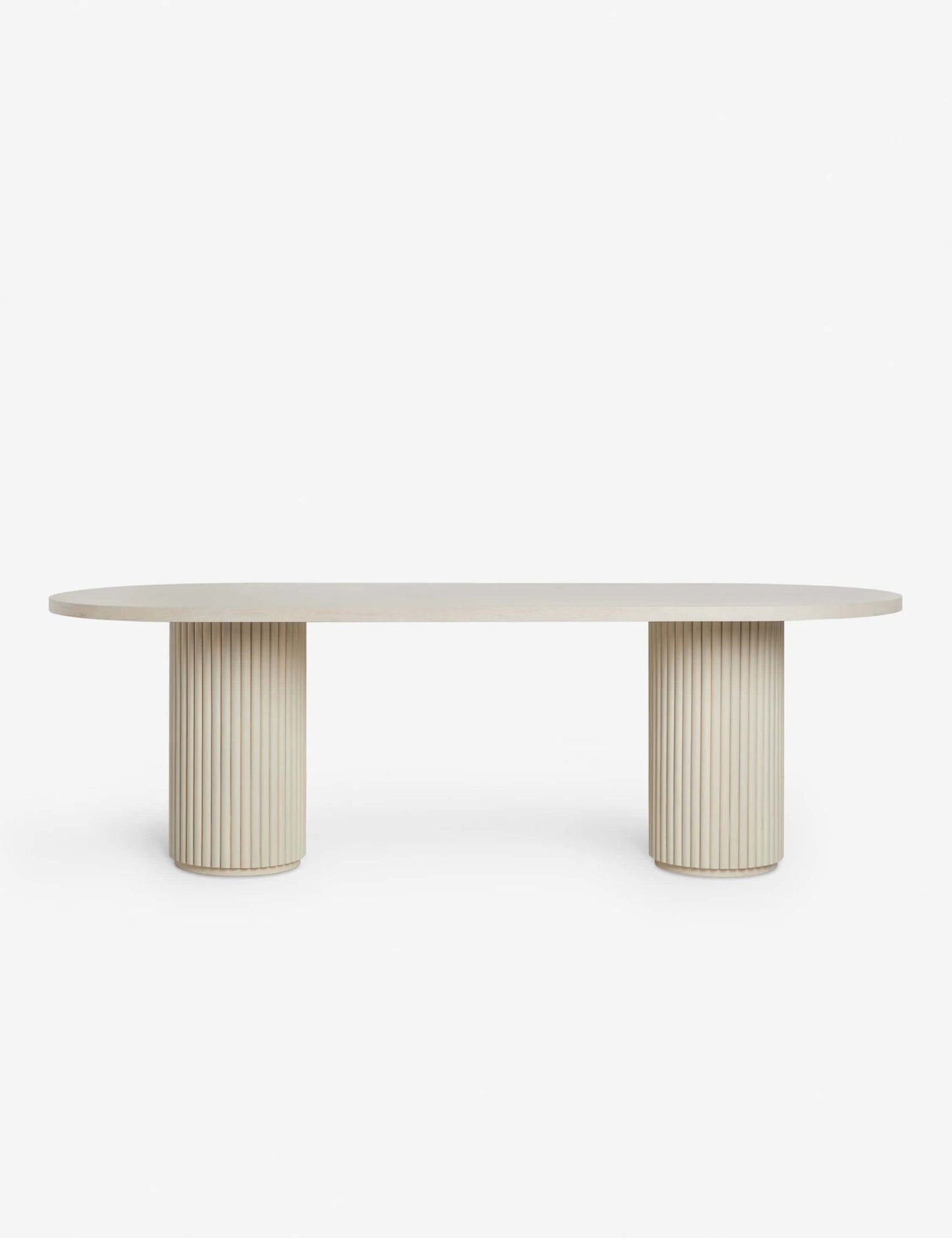 Meis Oval Dining Table ميس featuring a sculptural fluted base, crafted from acacia wood with a modern light finish.