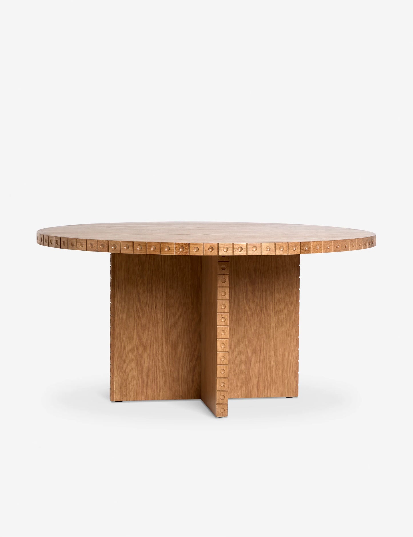 نور Nour Round Dining Table in natural oak, featuring a floating base and minimalist Wabi-Sabi-inspired design.