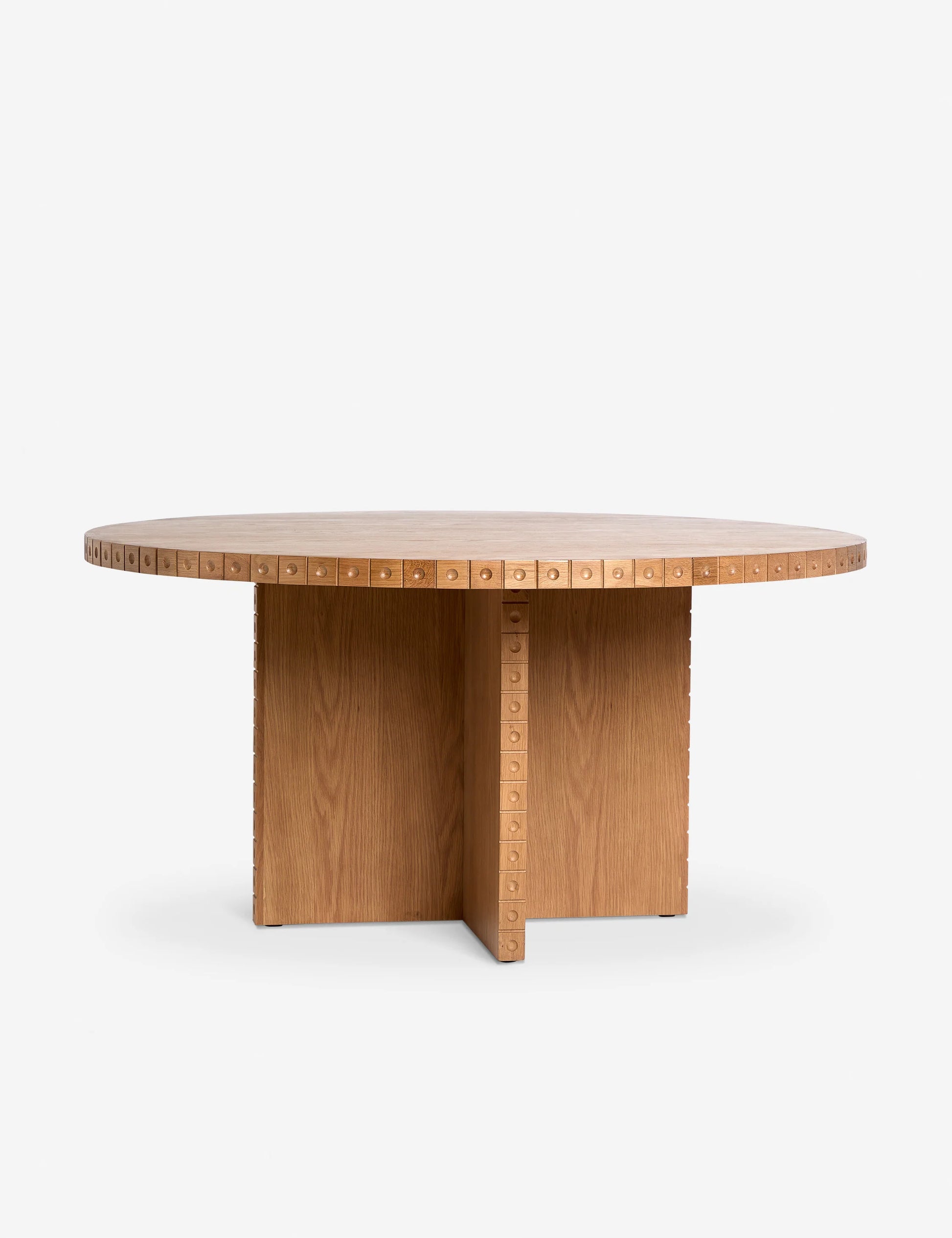 نور Nour Round Dining Table in natural oak, featuring a floating base and minimalist Wabi-Sabi-inspired design.