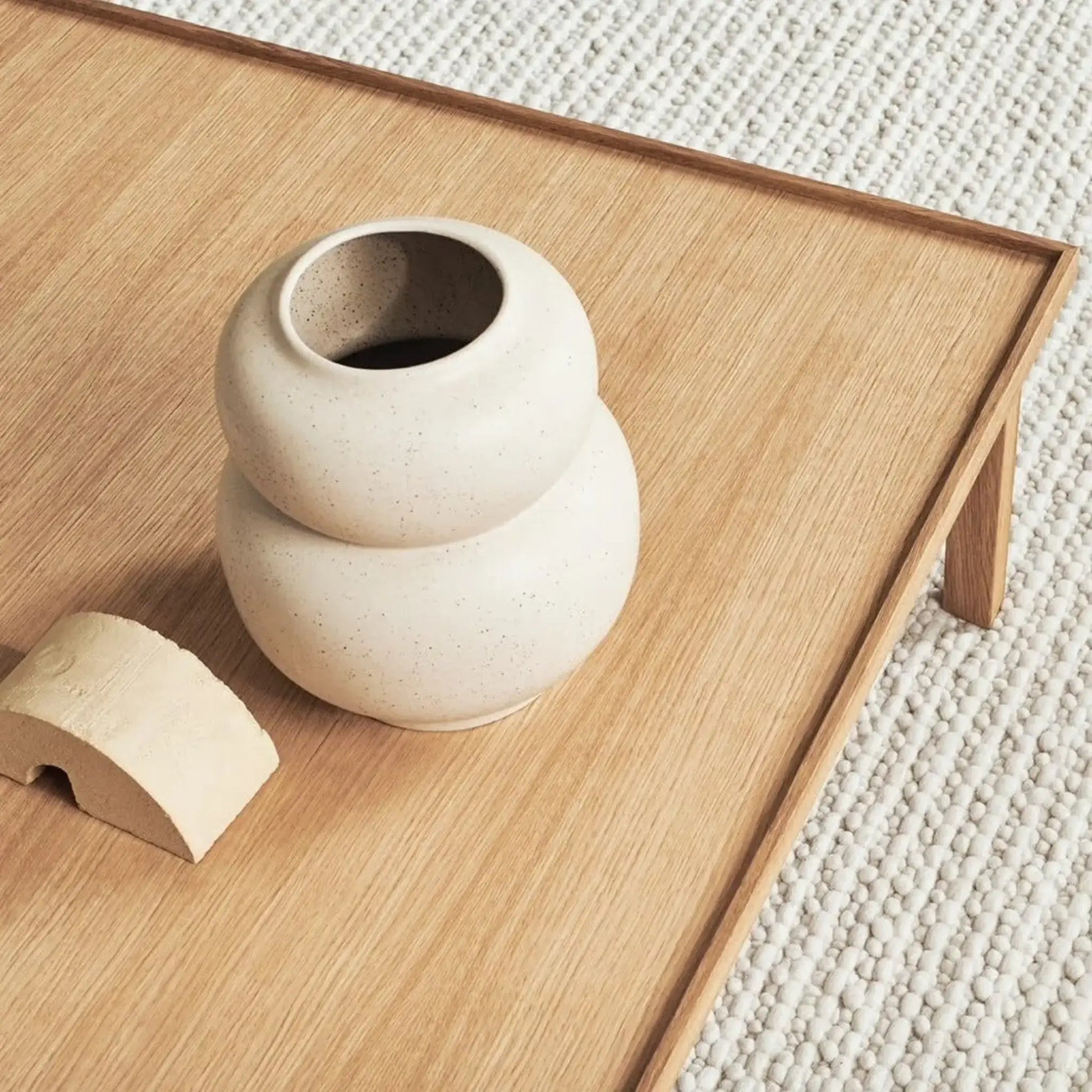 Close-up of the Raha Lounge Table top showing the oak grain and soft edge detailing