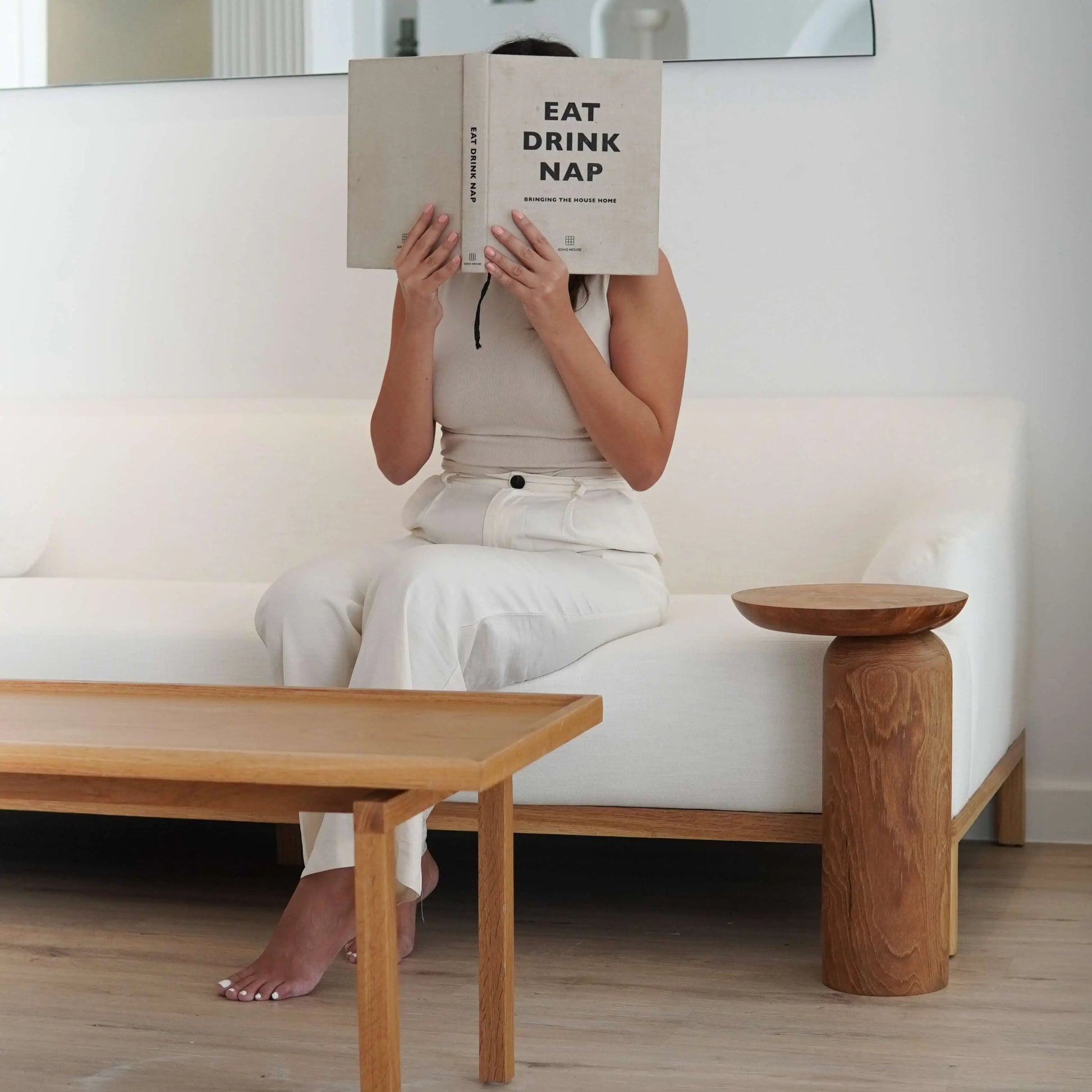 Sculptural wooden side table, Aża, blending natural textures with mindful living.