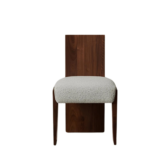 Front view of Loha Dining Chair لوح – A handcrafted oak chair with minimalist lines and plush seating.